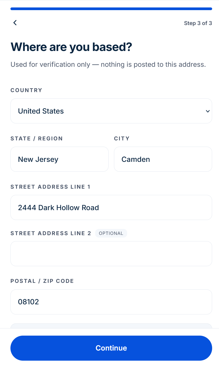 The Tell us about you form with first and last name, date of birth, phone number with a country dial code, and nationality.