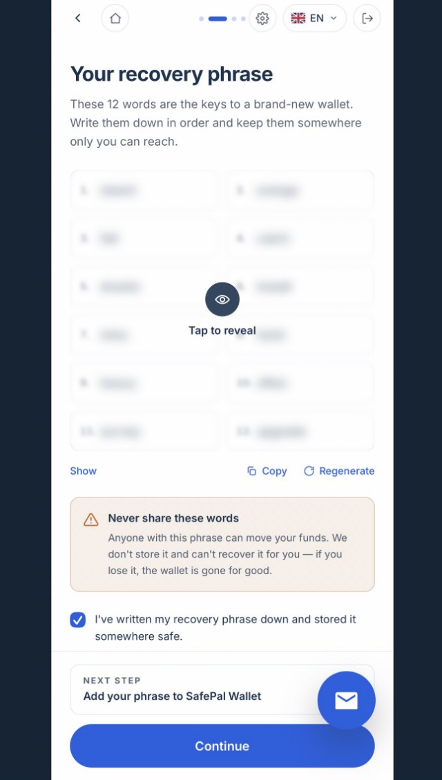 The recovery phrase screen with the twelve words blurred behind a Tap to reveal cover, above a warning never to share them.
